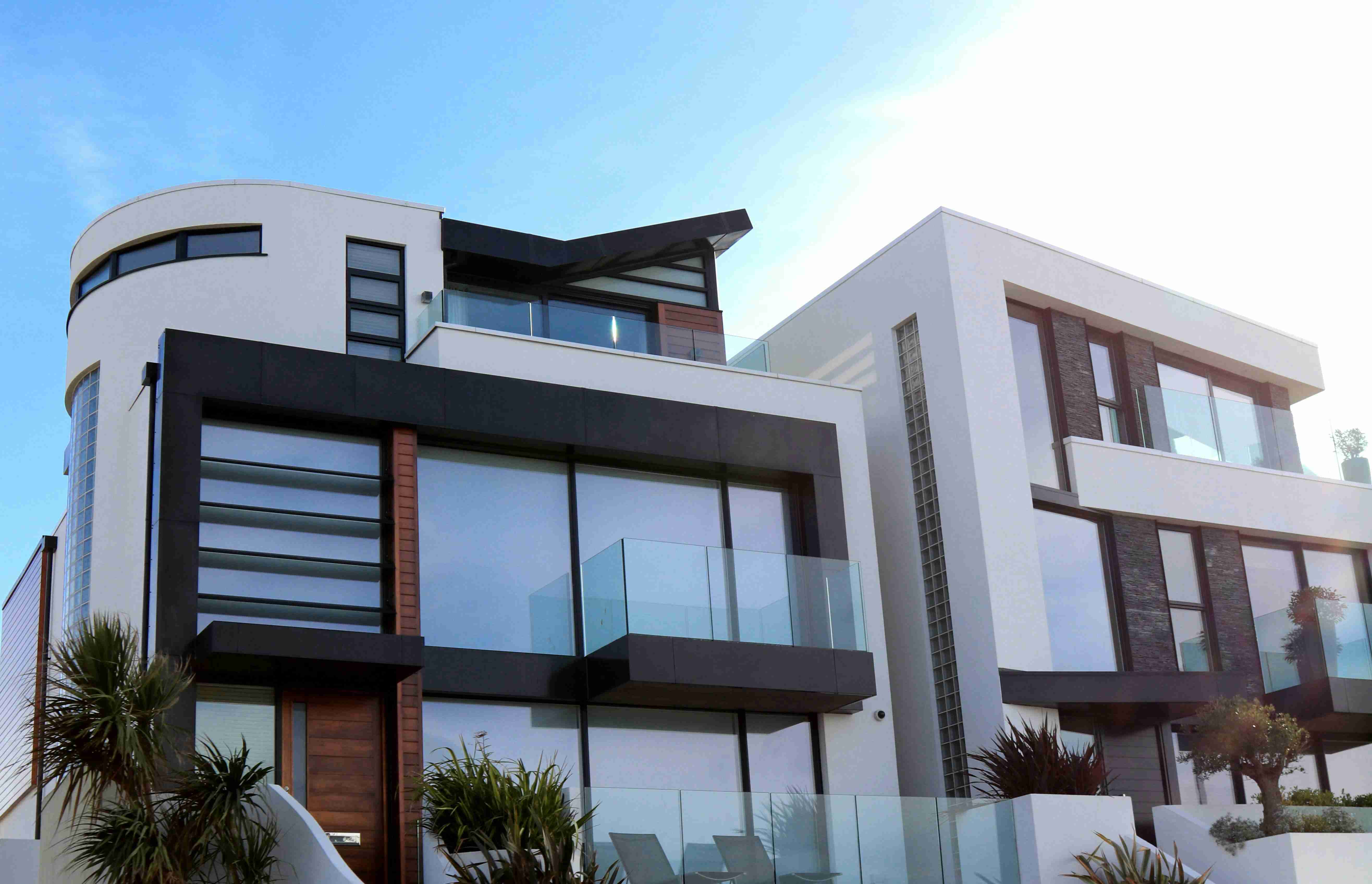 A contemporary apartment building with balconies — Real Estate