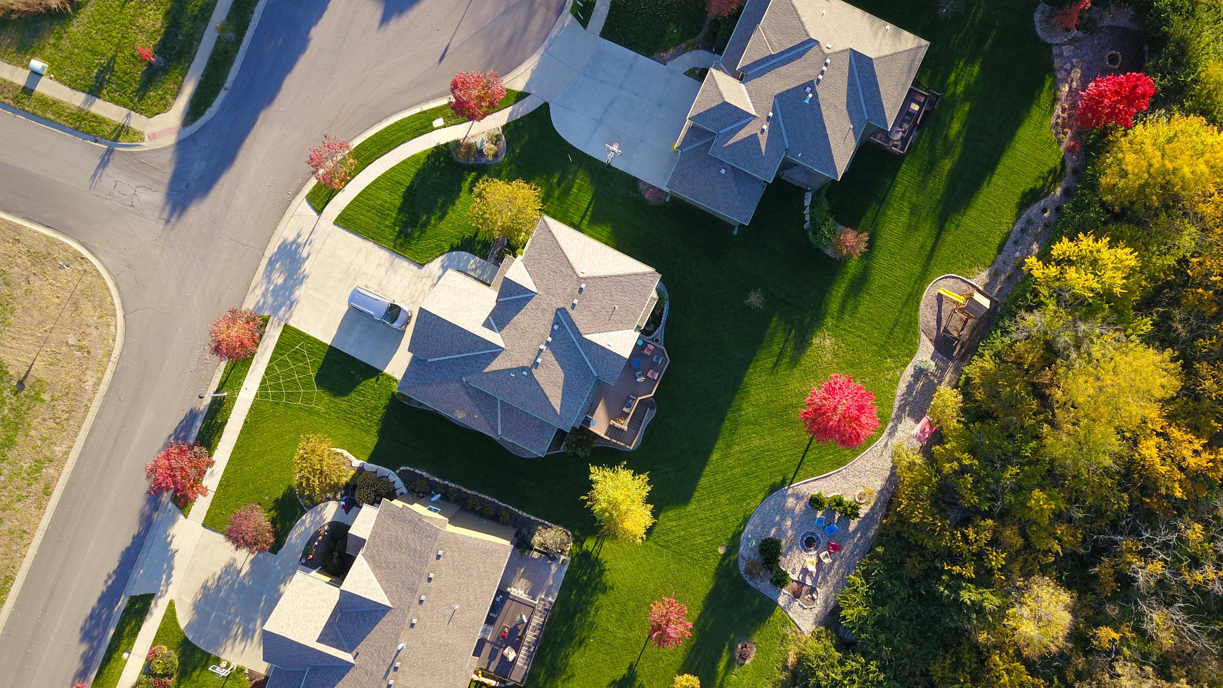 An aerial view of a suburban residential neighbourhood — Real Estate