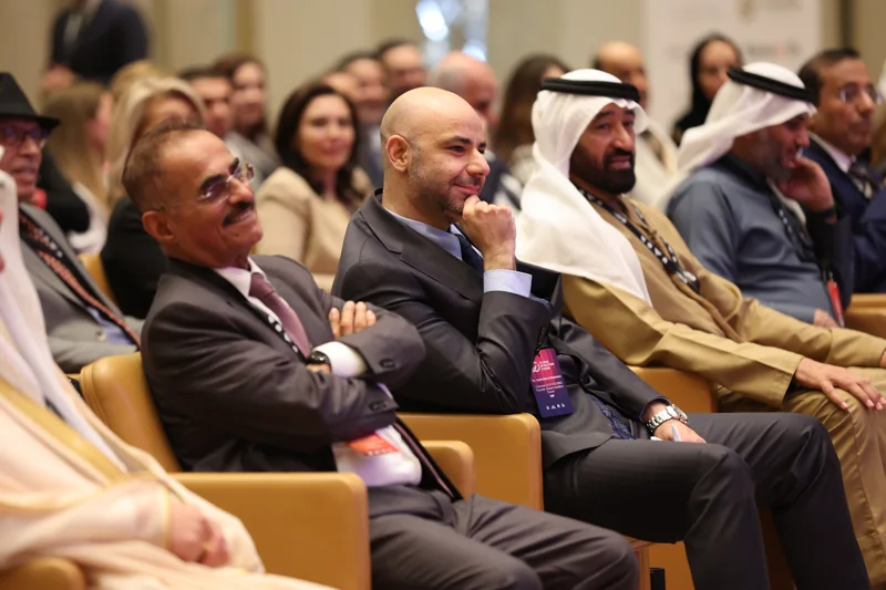 Delegates listening from the conference audience at GIF Georgia 2025.