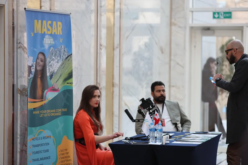 Visitors and exhibitors at a Masar stand at GIF Georgia 2025.