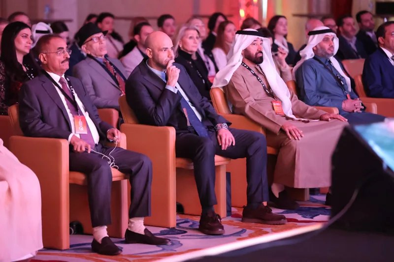 Delegates seated beside the stage at GIF Georgia 2025.